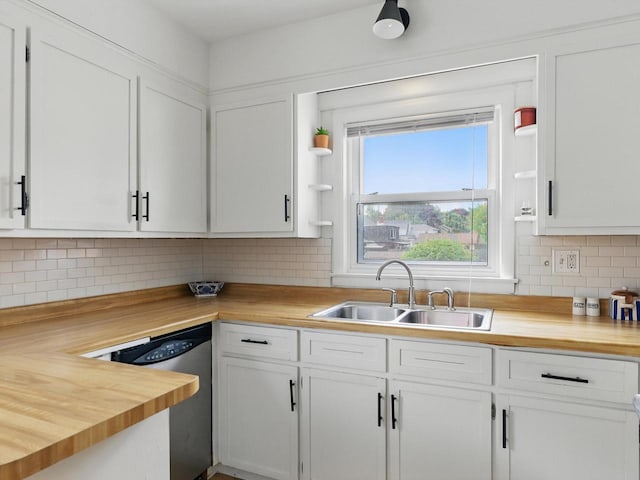 409 Huron St, Manitowoc, WI 54220 - kitchen with open shelves, butcher block counters, dishwasher, a sink, and white cabinets