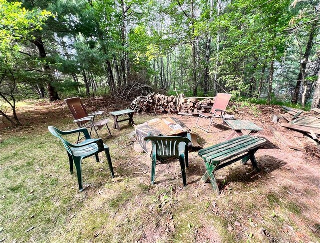 24730 Scenic View Ln, Spooner, WI 54801 - view of yard with a fire pit