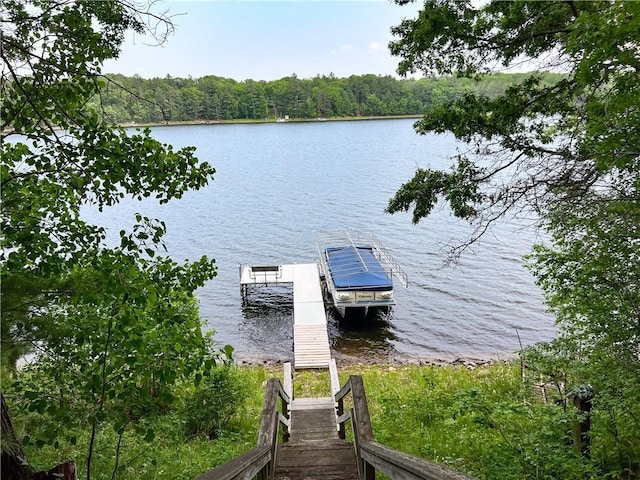 24730 Scenic View Ln, Spooner, WI 54801 - dock area with a water view and a wooded view