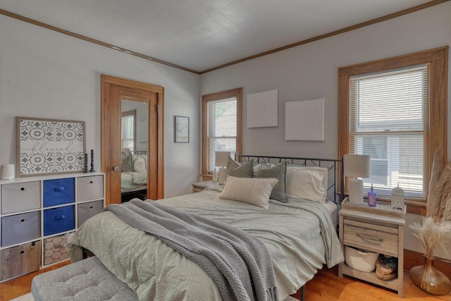 2116 N 60th St Unit 2118, Milwaukee, WI 53208 - bedroom featuring wood finished floors and crown molding
