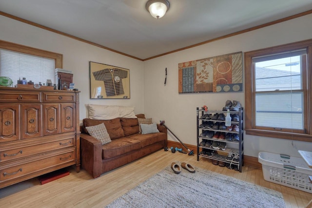 2116 N 60th St Unit 2118, Milwaukee, WI 53208 - living room featuring ornamental molding, light wood-style flooring, and baseboards