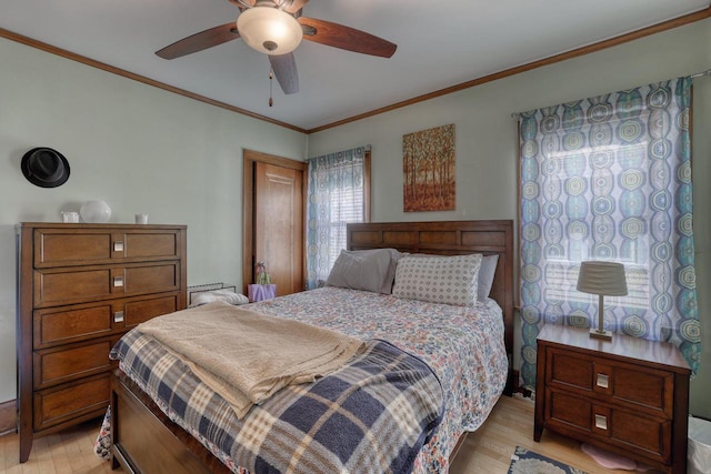 2116 N 60th St Unit 2118, Milwaukee, WI 53208 - bedroom featuring light wood-style floors, ornamental molding, and a ceiling fan