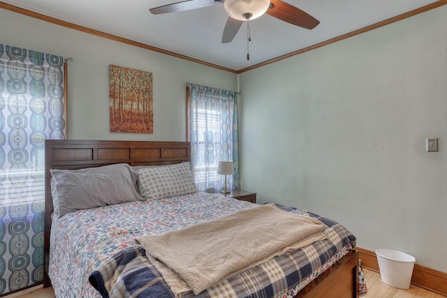 2116 N 60th St Unit 2118, Milwaukee, WI 53208 - bedroom with light wood-style floors, crown molding, baseboards, and ceiling fan