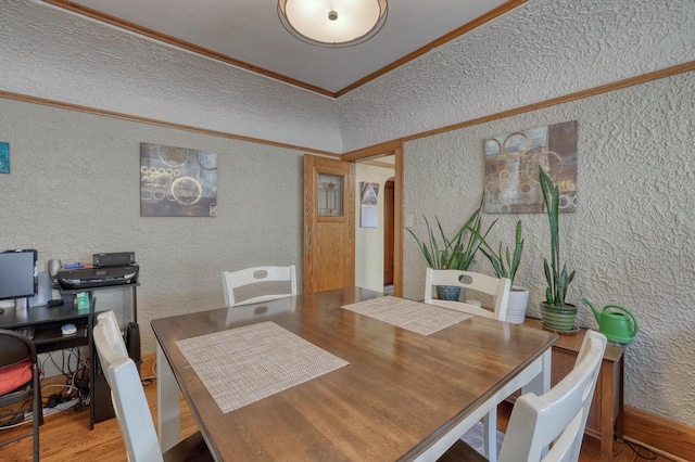 2116 N 60th St Unit 2118, Milwaukee, WI 53208 - dining area featuring a textured wall, crown molding, wood finished floors, and a desk