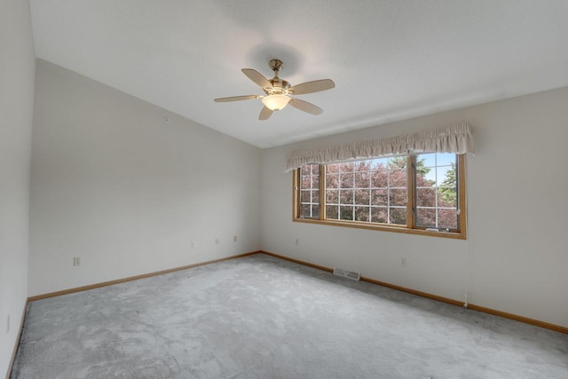 10380 W Whitnall Edge Cir Unit F, Franklin, WI 53132 - spare room featuring carpet, ceiling fan, baseboards, and vaulted ceiling