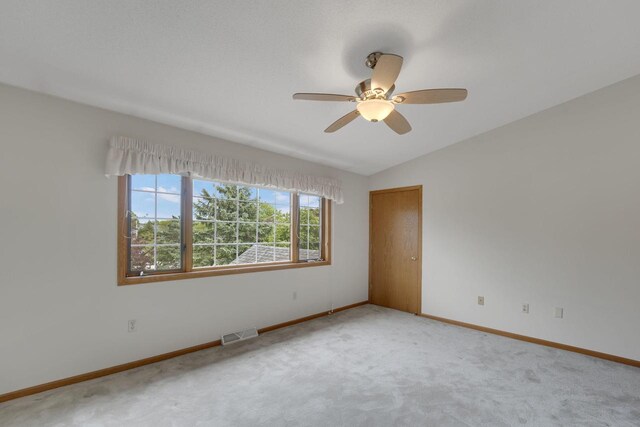 10380 W Whitnall Edge Cir Unit F, Franklin, WI 53132 - carpeted empty room featuring baseboards, a ceiling fan, and vaulted ceiling