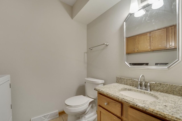 10380 W Whitnall Edge Cir Unit F, Franklin, WI 53132 - bathroom with vanity, toilet, and tile patterned flooring