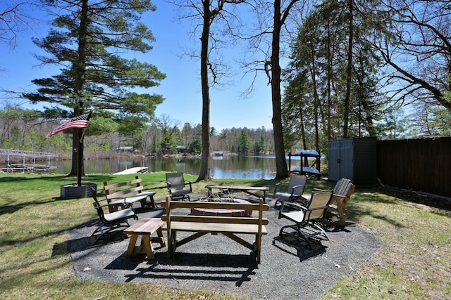 10151 N Sandy Beach Rd, Hayward, WI 54843 - view of patio featuring a water view