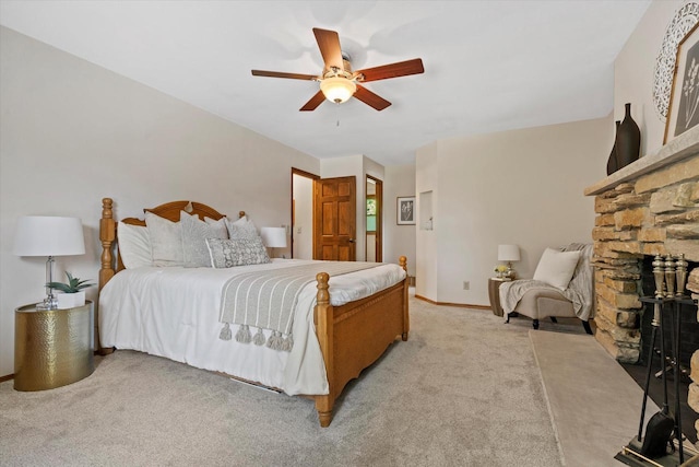 2824 Minot Ln, Waukesha, WI 53188 - bedroom featuring light carpet, a fireplace, ceiling fan, and baseboards