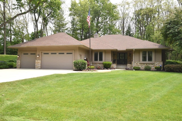 9111 400th Ct, Genoa City, WI 53128 - prairie-style house featuring stone siding, a garage, a chimney, and a front yard