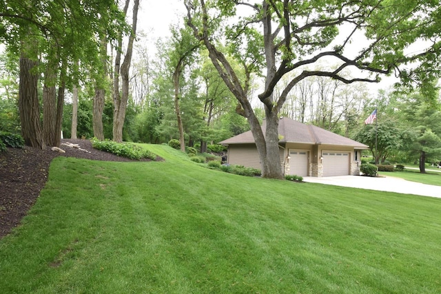 9111 400th Ct, Genoa City, WI 53128 - view of green lawn with a garage and concrete driveway