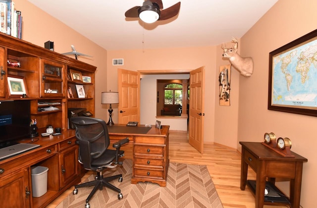9111 400th Ct, Genoa City, WI 53128 - office space featuring a ceiling fan, light wood finished floors, and built in study area