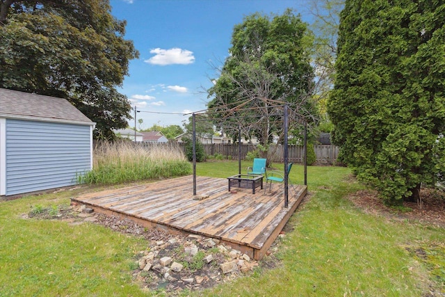 947 Cleveland St, Beloit, WI 53511 - view of yard featuring a deck, a gazebo, and an outbuilding