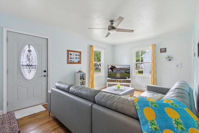 947 Cleveland St, Beloit, WI 53511 - living room with ceiling fan, wood finished floors, and baseboards
