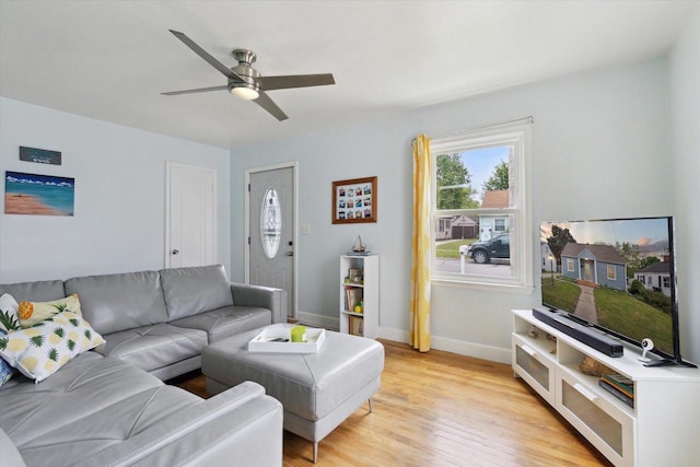 947 Cleveland St, Beloit, WI 53511 - living area featuring light wood-type flooring, ceiling fan, and baseboards