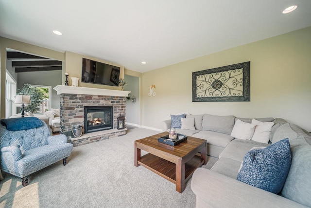 905 W Hubble Ln, Appleton, WI 54913 - carpeted living area featuring a glass covered fireplace, baseboards, and recessed lighting