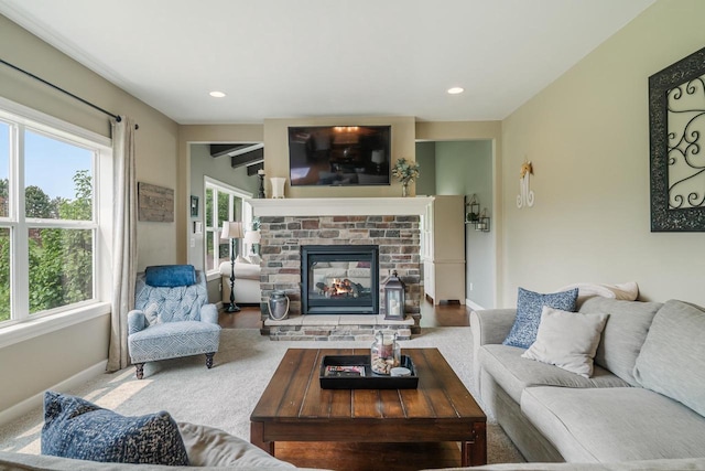 905 W Hubble Ln, Appleton, WI 54913 - living room with baseboards, a multi sided fireplace, and recessed lighting