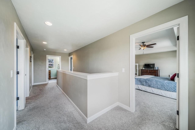 905 W Hubble Ln, Appleton, WI 54913 - hallway featuring light carpet, an upstairs landing, baseboards, and recessed lighting