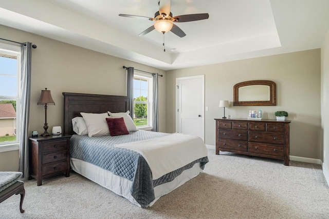 905 W Hubble Ln, Appleton, WI 54913 - bedroom with carpet floors, baseboards, a raised ceiling, and a ceiling fan
