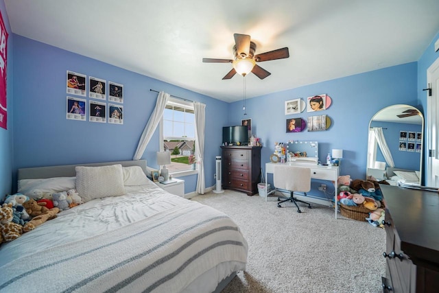 905 W Hubble Ln, Appleton, WI 54913 - bedroom with carpet flooring, ceiling fan, baseboards, a desk, and arched walkways