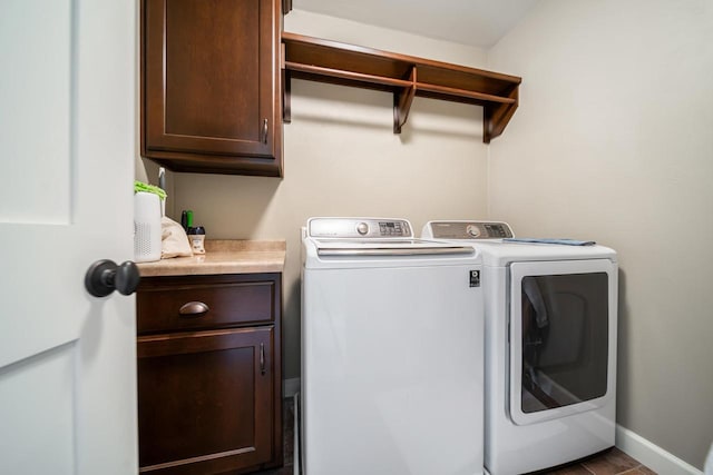 905 W Hubble Ln, Appleton, WI 54913 - washroom featuring washer and dryer, cabinet space, and baseboards