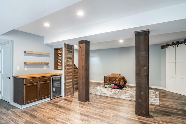 905 W Hubble Ln, Appleton, WI 54913 - indoor dry bar with wine cooler, wood finished floors, baseboards, and recessed lighting