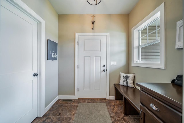905 W Hubble Ln, Appleton, WI 54913 - foyer featuring baseboards and dark stone finish floors