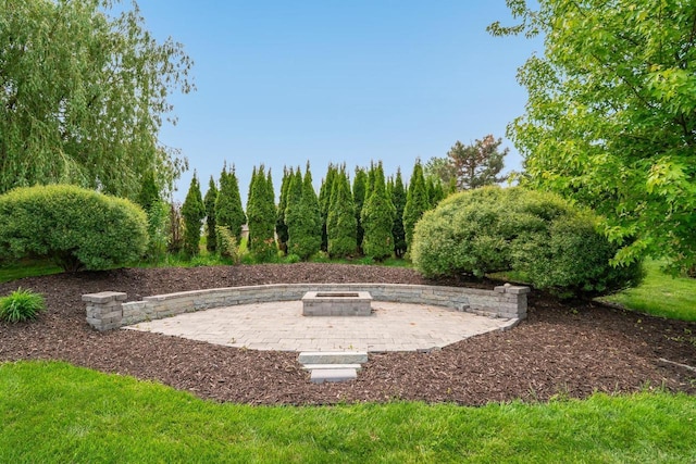 905 W Hubble Ln, Appleton, WI 54913 - view of yard featuring an outdoor fire pit and a patio