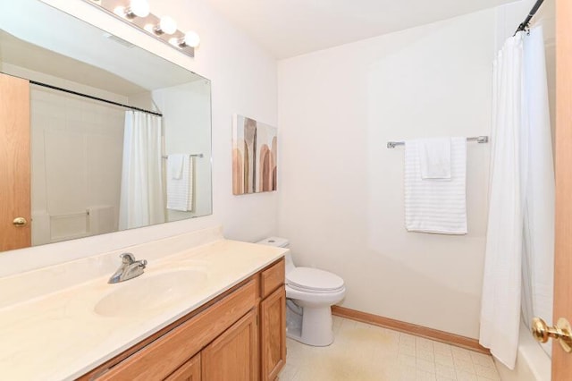 2425 Fox River Pkwy Unit H, Waukesha, WI 53189 - full bathroom featuring vanity, tile patterned floors, toilet, baseboards, and shower / tub combo with curtain