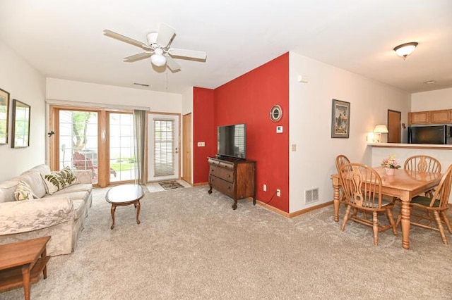 2425 Fox River Pkwy Unit H, Waukesha, WI 53189 - living room with light colored carpet, a ceiling fan, and baseboards