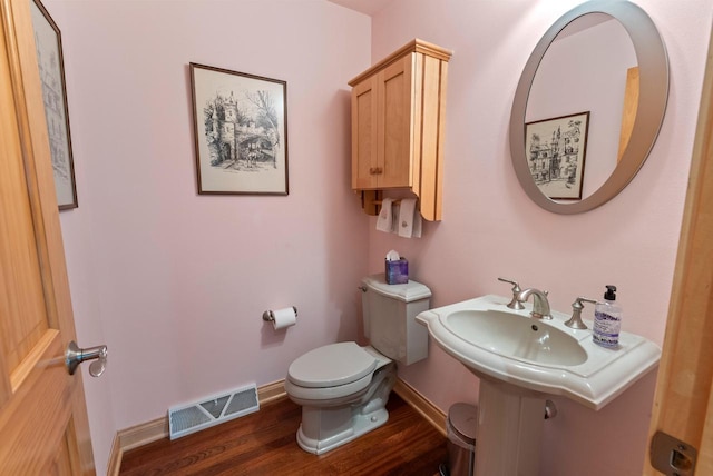 W3847 Timber Lake Rd, East Troy, WI 53120 - bathroom with wood finished floors, toilet, and baseboards