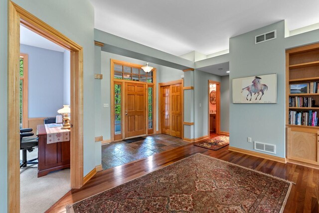 W3847 Timber Lake Rd, East Troy, WI 53120 - entrance foyer featuring baseboards and wood finished floors