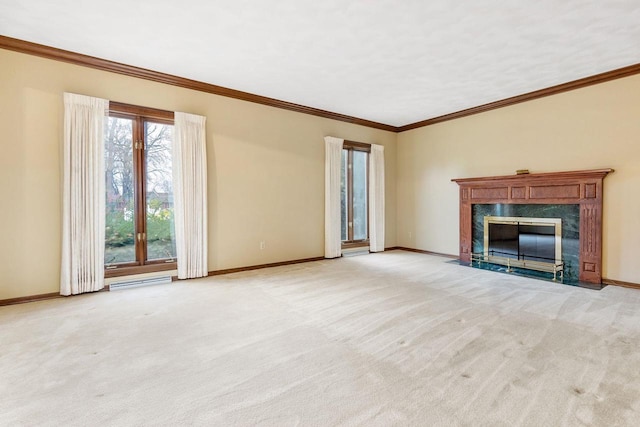 28 W Lake Rd, Menasha, WI 54952 - unfurnished living room featuring baseboards, carpet flooring, a premium fireplace, and crown molding