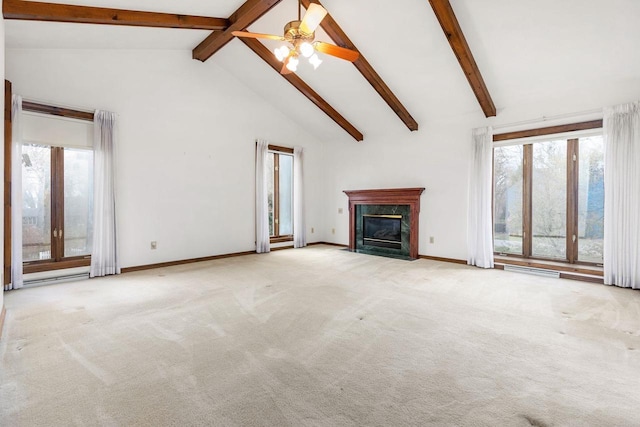 28 W Lake Rd, Menasha, WI 54952 - unfurnished living room with plenty of natural light, carpet floors, a fireplace, beamed ceiling, and high vaulted ceiling