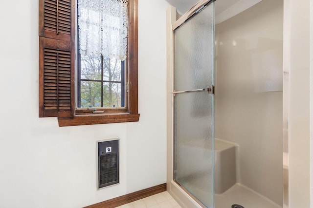 28 W Lake Rd, Menasha, WI 54952 - bathroom with a stall shower and baseboards