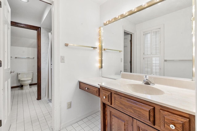 28 W Lake Rd, Menasha, WI 54952 - full bath featuring vanity, tile patterned flooring, toilet, a shower with shower curtain, and baseboards