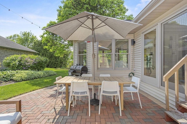 1323 Bradford Ct, Neenah, WI 54956 - view of patio / terrace featuring outdoor dining space and area for grilling