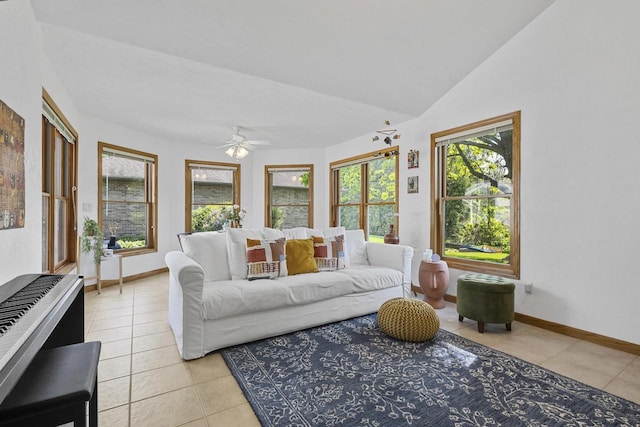 1323 Bradford Ct, Neenah, WI 54956 - living room with light tile patterned floors, ceiling fan, baseboards, and lofted ceiling