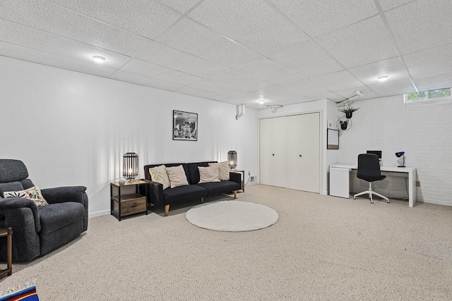 1323 Bradford Ct, Neenah, WI 54956 - living area featuring carpet floors, a desk, a paneled ceiling, and baseboards