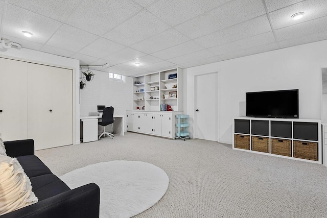 1323 Bradford Ct, Neenah, WI 54956 - living room featuring a drop ceiling, a desk, and carpet floors