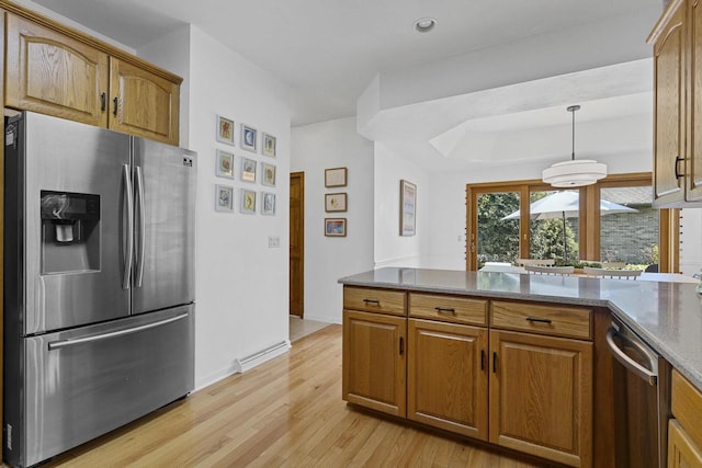 1323 Bradford Ct, Neenah, WI 54956 - kitchen with appliances with stainless steel finishes, light wood-type flooring, a peninsula, brown cabinets, and baseboards