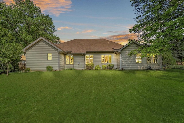 1323 Bradford Ct, Neenah, WI 54956 - view of front of property with a lawn and roof with shingles