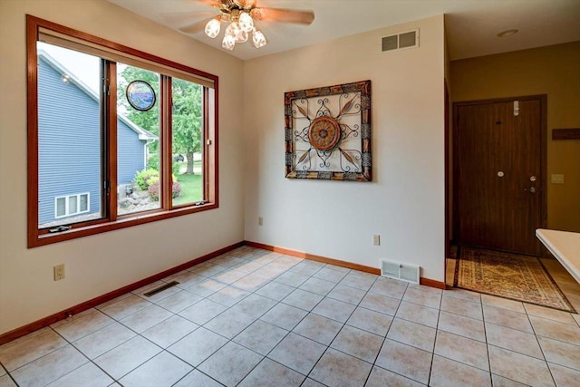 2040 Continental Ln, Cross Plains, WI 53528 - unfurnished room with ceiling fan and light tile patterned flooring