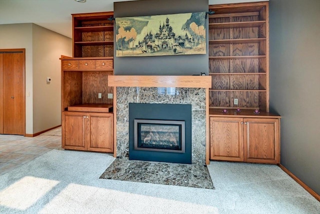 2040 Continental Ln, Cross Plains, WI 53528 - living room featuring light carpet and a tiled fireplace