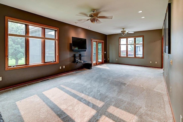 2040 Continental Ln, Cross Plains, WI 53528 - unfurnished living room with carpet, ceiling fan, and recessed lighting