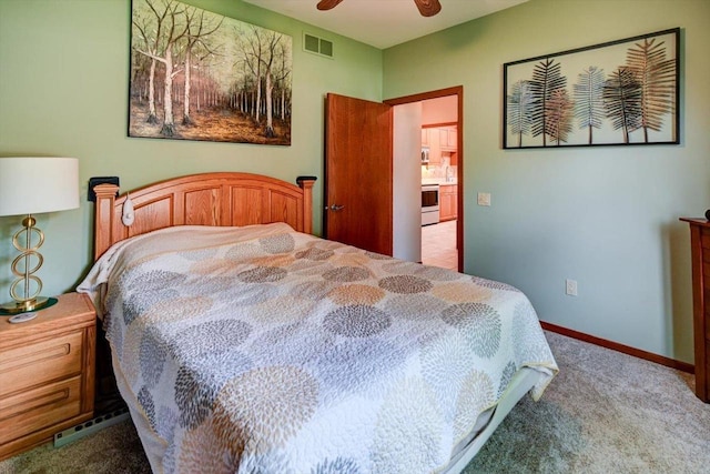 2040 Continental Ln, Cross Plains, WI 53528 - carpeted bedroom featuring a ceiling fan and baseboards