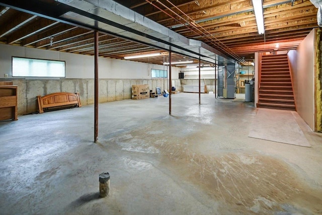 2040 Continental Ln, Cross Plains, WI 53528 - below grade area featuring heating unit and stairway
