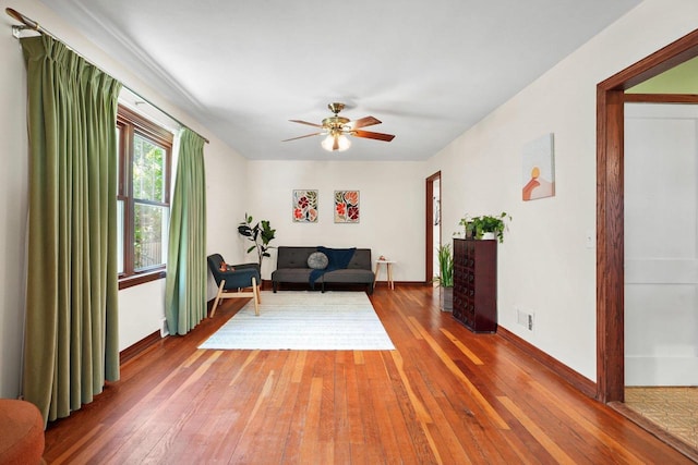 129 Division St, Madison, WI 53704 - sitting room with hardwood / wood-style floors and ceiling fan