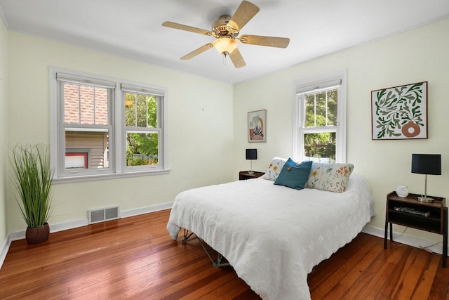129 Division St, Madison, WI 53704 - bedroom with hardwood / wood-style floors and ceiling fan