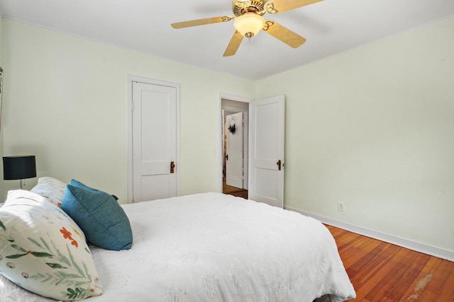 129 Division St, Madison, WI 53704 - bedroom with wood finished floors and ceiling fan